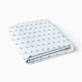 Jersey fitted sheet with flowers blue with stars