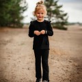 Black cotton blouse with ruffles on shoulders
