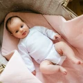Pink baby nest with flowers 75x75