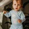 Body dziecięce niebieskie z długim rękawem i słonikiem